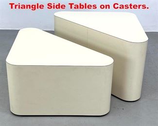 Lot 561 Pair White Laminate Triangle Side Tables on Casters. 