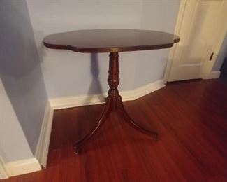 Mahogany tilt top table $30
