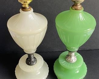 wo Art Deco Houze Glass Table Top Lamps; Houze Nile Green Lamp and Houze Moonstone Lamp. Each measuring 13" high and in good condition with some light wear to the metal spacers. These lamps do NOT have the electrical component. 
