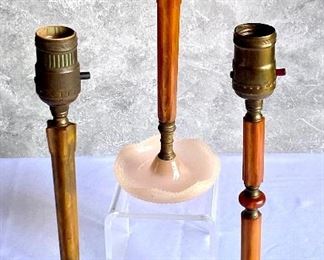 Three Houze Glass Vintage Art Deco Table Lamps with Bakelite Posts each measuring 12" and do NOT contain the electrical components. Two of these lamps have the same decorative leaf design base and one is different. (this one needs a new switch) 