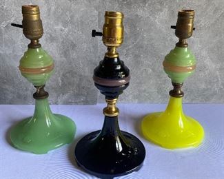 Set of Vintage Art Deco Houze Glass Lamps in a different colors including a black one which is a rare color and has the Houze label on the bottom. One features uranium glass on the bottom. All do not have the electric component. 