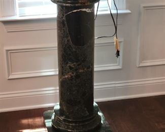 Black marble pedestal 