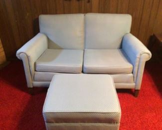 Light Blue Loveseat with Ottoman.