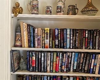 Lots of books, collection of beer steins