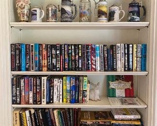 Lots of books, collection of beer steins