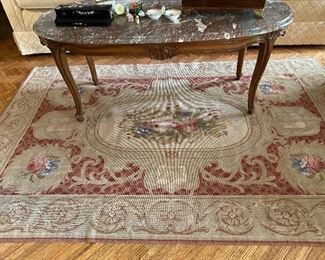 Needlepoint rug, French marble top coffee table