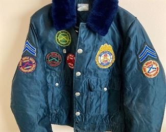 Vintage police jacket with hand sewn NRA patches