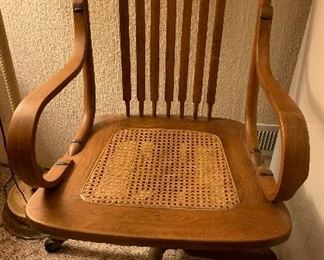 Vintage rolling swivel office chair with intact cane work
