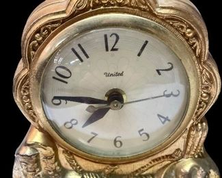 ANTIQUE “UNITED” CLOCK W/HORSE FIGURE AND BAKE-LITE BASE