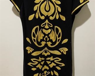 Large selection of clothing (Carlisle, Ralph Lauren, JNY, Escada, Lilly Pulitzer, and more) from many eras including purses, shoes, scarves, and belts. Wonderful outer wear coats in many different styles.