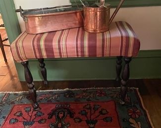 Vintage rug, bench, and additional copper pieces.