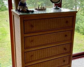 Wicker highboy to match the twin beds.