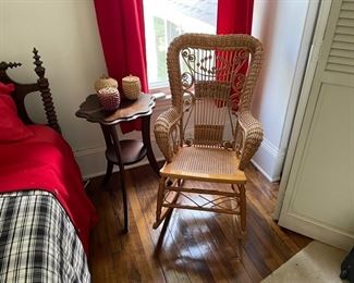Passamaquoddy hand made baskets with scrolled wicker chair