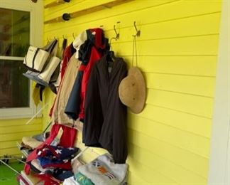 Collection of nautical items including life vests, pair of Sculling oars, clothing, rain suits, U.S. 740N Pea Jacket, and more...