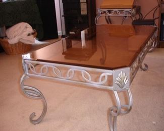 Cocktail table has two matching side tables as well