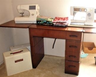 Sewing machines (both have cases) sewing table and some fabric