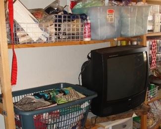 On the shelf above are all trims. Anyone want an analog TV? Small storage bins below