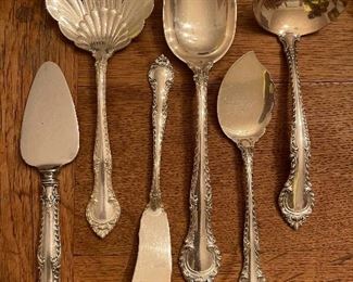 Vintage Sterling Silver Set of 
    “English Gadroon”
Closeup of Several Serving Pieces 