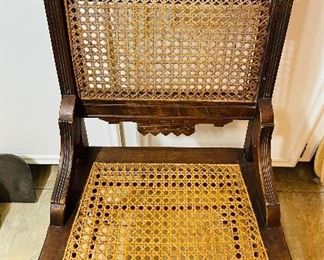 Several Beautiful Cane Chairs Throughout Home