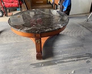 . . . . a marble-topped coffee table