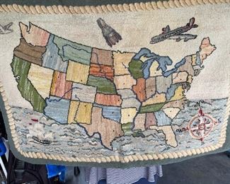 . . . an authentic vintage hook rug with a transportation theme