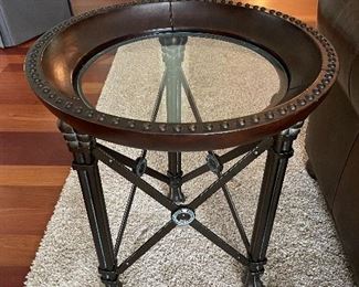 Iron, wood, glass end table. Measures 20"D x 25"H.