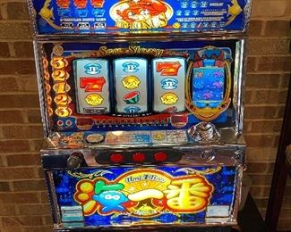 Vintage Yamasa 'Sea Story' Slot Machine with tokens