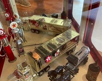 On this shelf you'll note an Original Texaco Service Station Oil Can with very good graphics and still filled with lubricant.  