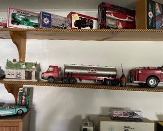 A few larger Texaco Trucks dominate the space in this shot - in remarkable condition, too!  