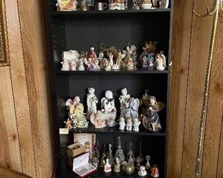 This bookshelf is literally filled with smalls - ceramic, porcelain, resin and wood what-knots that make a happy statement in your home.  
