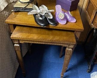 A set of two Nesting 1960/70's Side Tables are fun to work with in any home.  