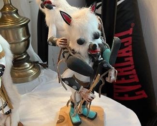 There are around 15 Hopi and Navajo Indian Kachina Dolls of various sizes and mediums.  Most are artist signed on the bottom!  