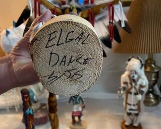 Signature on the bottom of this highly decorated piece.  