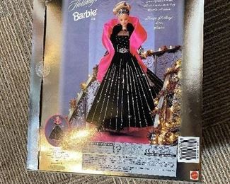 The back of the box showing all details on the doll.  