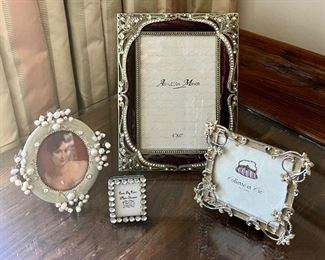 We have a large assortment of pictures frames at this sale!