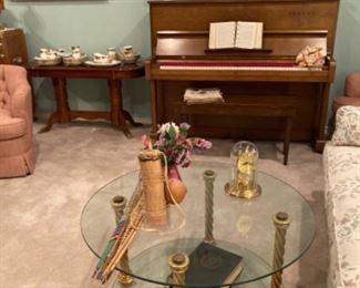 Beautiful double glass table, cherry sofa table with lion feet, Yamaha piano, and a beautiful framed tapestry from England.
