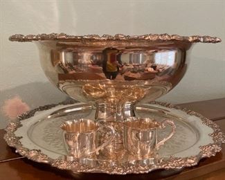 Silverplated Punch Bowl with 12 cups, tray and ladle.