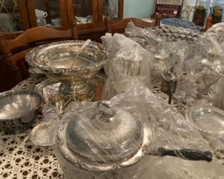 Silver-plated tea service items.   Too many to picture all of them.  