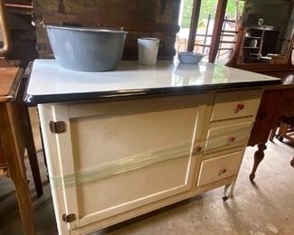 Lower portion of a Hoosier Cabinet with Enamel top