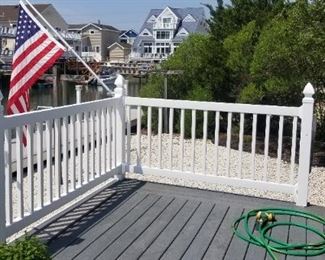 Limited amount of vinyl railing; early generation Trex decking