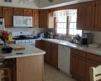 Cute kitchen with island; fridge & dishwasher not available