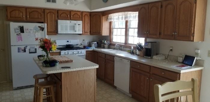 Cute kitchen with island; fridge & dishwasher not available