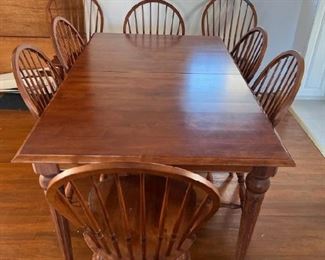 Beautiful Ethan Allen dining room set seats 8 and includes two extra leaves (not shown) that are brand new in box. Solid cherry and in perfect condition.