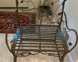 WROUGHT IRON FILIGREE LEAF CHAIR THAT MATCHES THE TABLE 