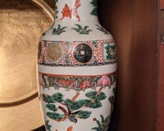 Close-up of the pair of Asian porcelain vases (purchased from John K. Fong, Hong Kong, 1972 and documented to be produced from 1780 - 1794 A.D. of the Ching/Qing Dynasty). 