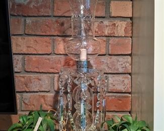 One of a PAIR of vintage electric lusters, flanking the TV in the den, plus the allure of fake plants.