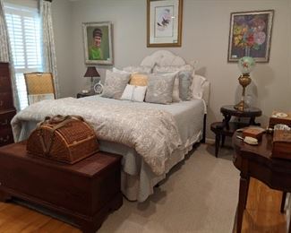 Very well done queen size bed, with all custom linens from Pottery Barn, antique heart pine blanket chest, 1940's mahogany game table and pair of 1930's hand-carved mahogany side tables, with tooled leather and glass tops.