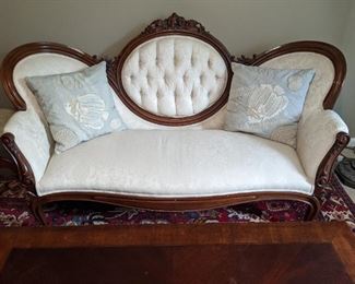 Swoopy couch, w/fishy pillows. perfect for an afternoon ladies tea party!