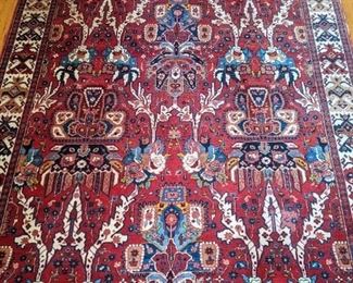 Gorgeous hand-woven Persian Bakhtiari rug, 100% wool face, measures 10' 9" x 7' 3".
