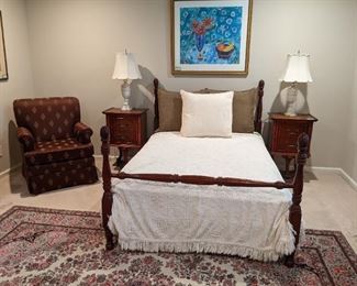 1940's ribbon mahogany half-poster double bed, with vintage chenille spread. Unusually spectacular pair of 1930's Asian-influenced two-drawer mahogany nightstands with original brass pulls, on carved feathery bases. 